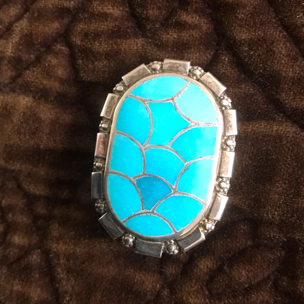 Vintage Zuni Sleeping Beauty Turquoise Pendant/Pin
Carmichael Haloo
